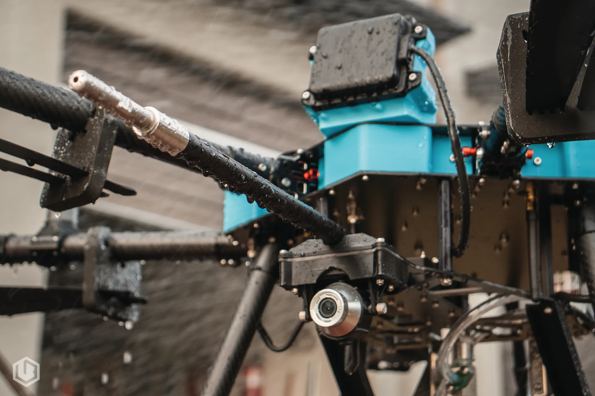 Close-up of drone washing equipment in action